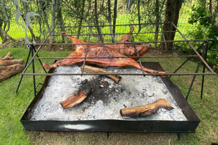 Cocina de fuego puerco asado